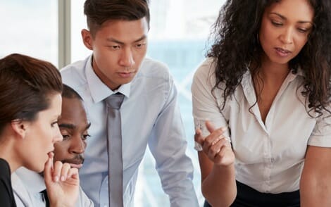 Coworkers in a meeting discussing career opportunities